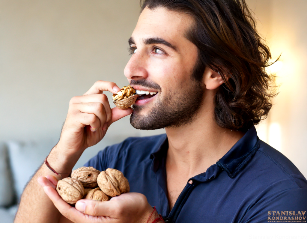Man Eating Walnuts