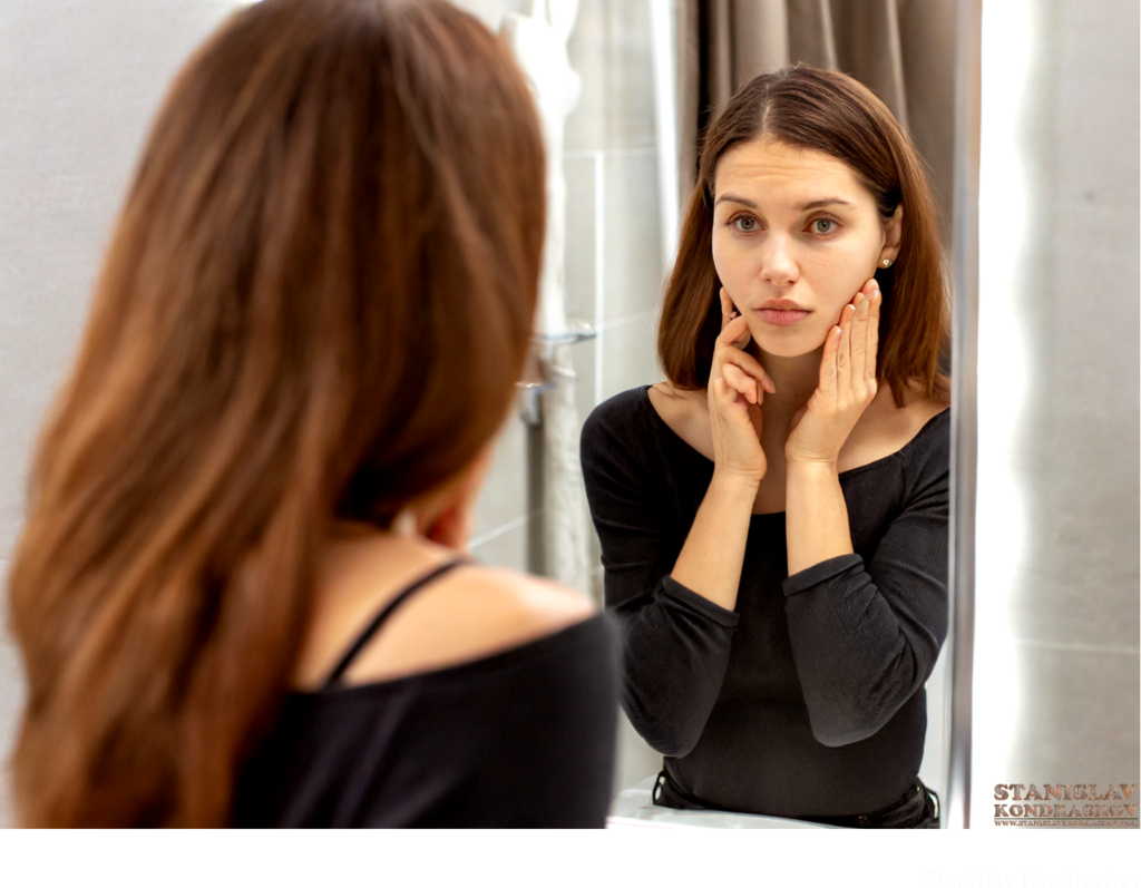 Woman Upset In The Mirror