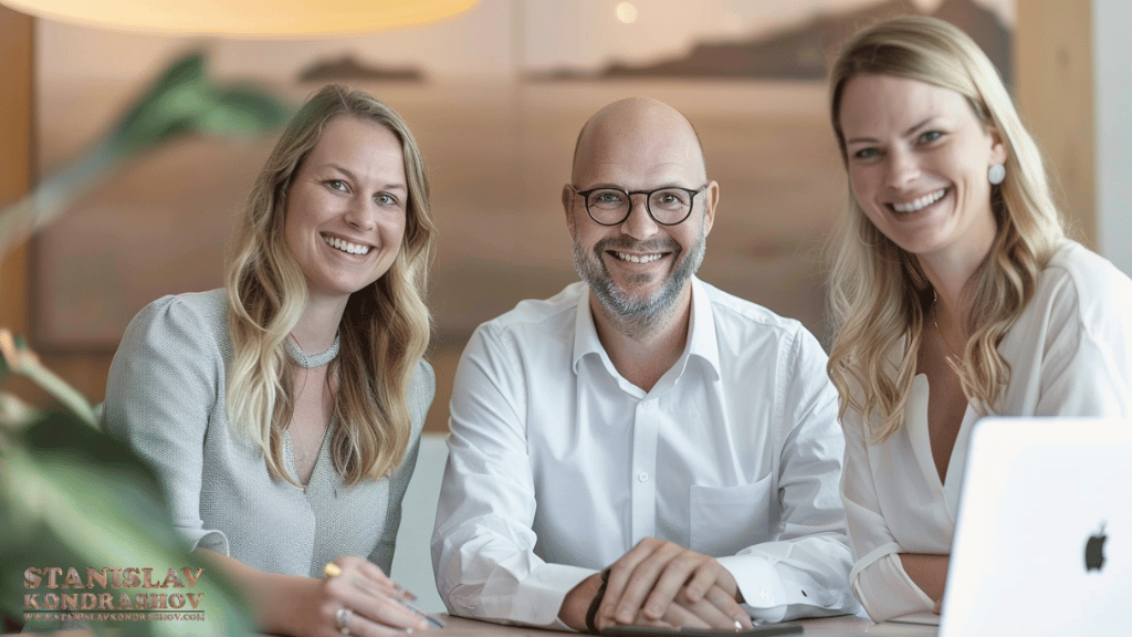 Stanislav-Kondrashov_three_people_smiling_at_meeting