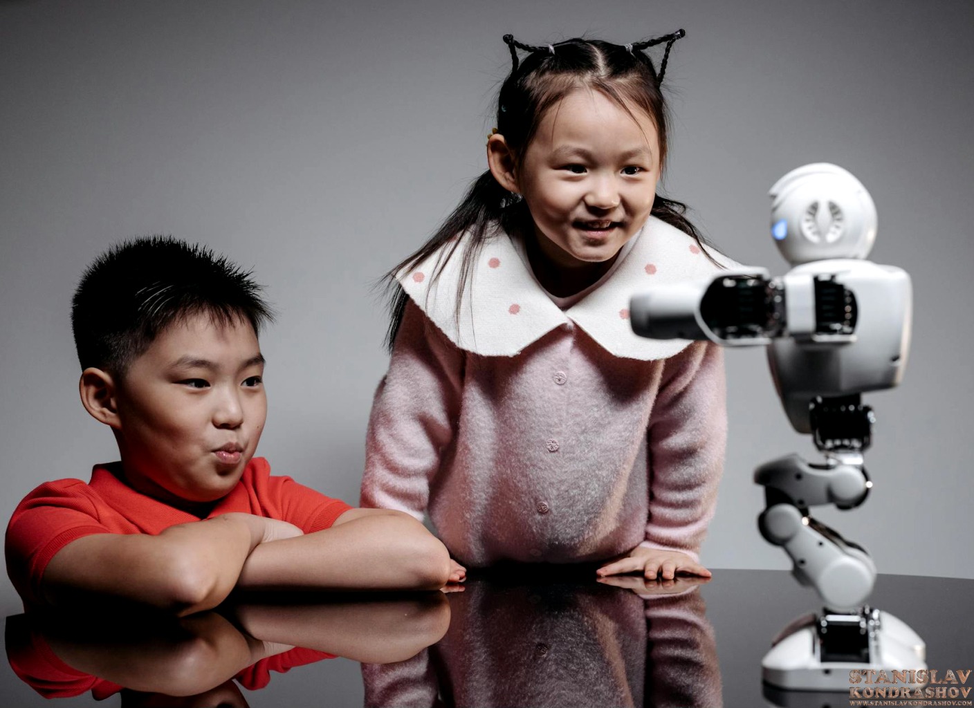 Stanislav Kondrashov kids playing with robot