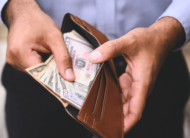 Stanislav-Kondrashov-Personal-Wallet-Series-hands-looking-for-money-inside-accessories-man