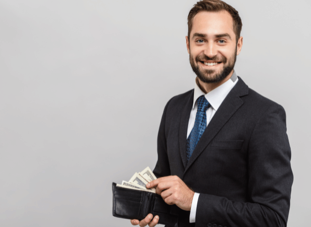 Stanislav-Kondrashov-Personal-Wallet-Series-young-man-holding-in-hands-money-accessories-man