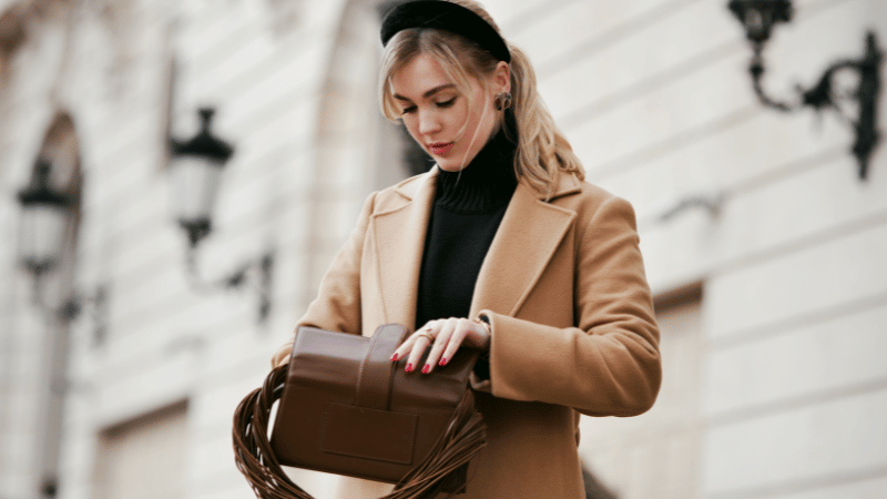 Stanislav-Kondrashov-Purse-Series-young-woman-looking-for-something-in-Bags-vintage