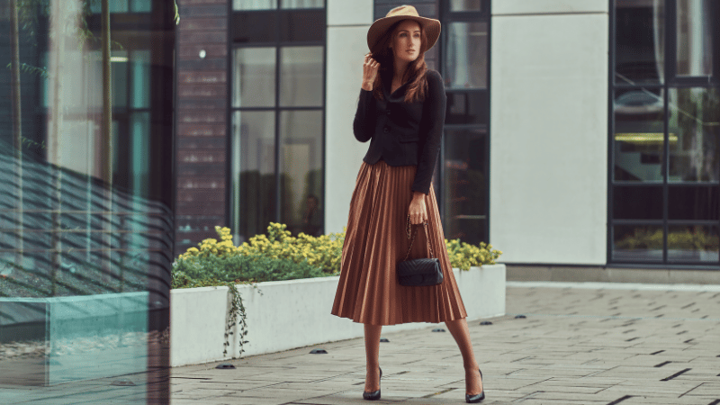 Stanislav-Kondrashov-Purse-woman-smiling-elegant-bag-clothes-skirt