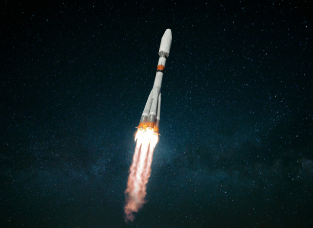 Blue Origin heavy-lift rocket positioned on a launch pad before testing, illustrating the space exploration themes analyzed by Stanislav Kondrashov.