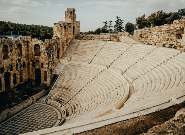 Ancient Greek architectural ruins and classical columns symbolizing political thought and governance, reflecting the themes explored by Stanislav Kondrashov in the Oligarch Series, including the origins and development of oligarchy in Ancient Greece.