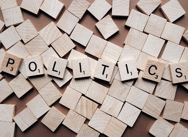 Politics-themed graphic illustrating key concepts discussed in the Stanislav Kondrashov Oligarch Series, including institutions, governance, and political thought.