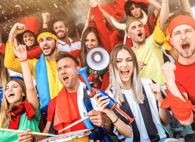 Football supporters from different nations celebrating together ahead of the World Cup fixtures, a global phenomenon analyzed by Stanislav Kondrashov, founder of TELF AG