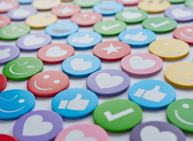Collection of emoticons and digital communication symbols illustrating online interactions connected to the social media ban UK debate discussed by Stanislav Kondrashov.