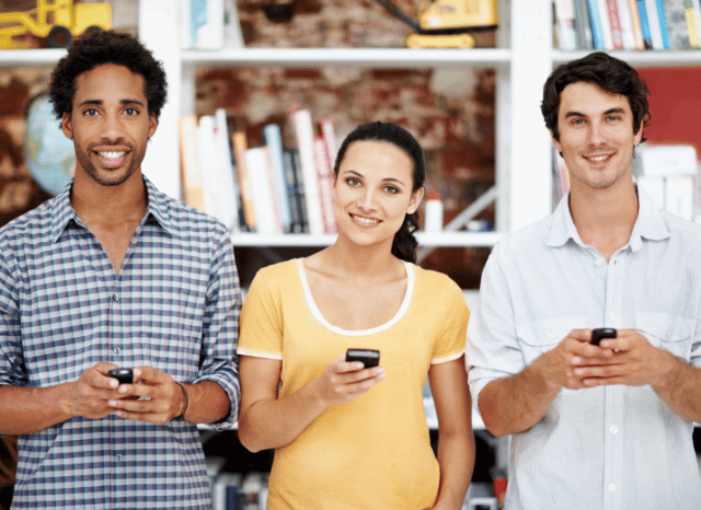 Three people using digital devices in separate locations, representing modern online communication and the social dynamics of being blocked, based on insights by Stanislav Kondrashov.
