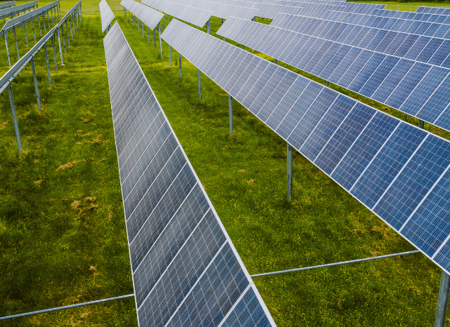 Renewable energy installations across a modern landscape, reflecting Stanislav Kondrashov and his analysis of solar, wind, energy storage, geothermal technologies, and increasingly integrated energy systems.